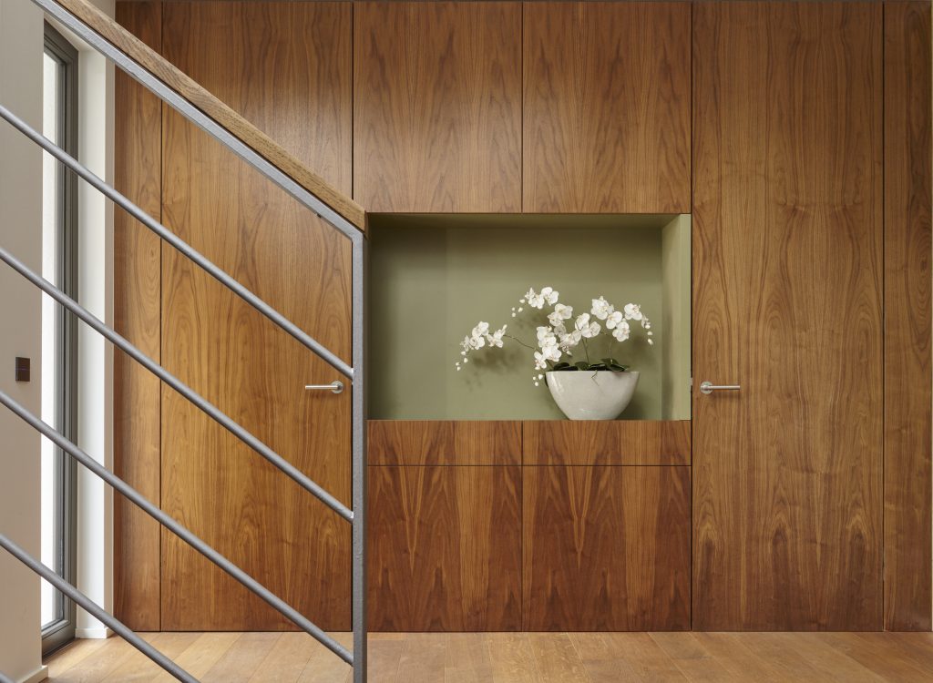 Flowers and walnut wall covering in home