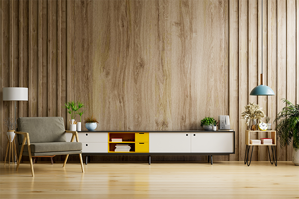 Neutral modern living room with accent chairs and custom wood shelving.