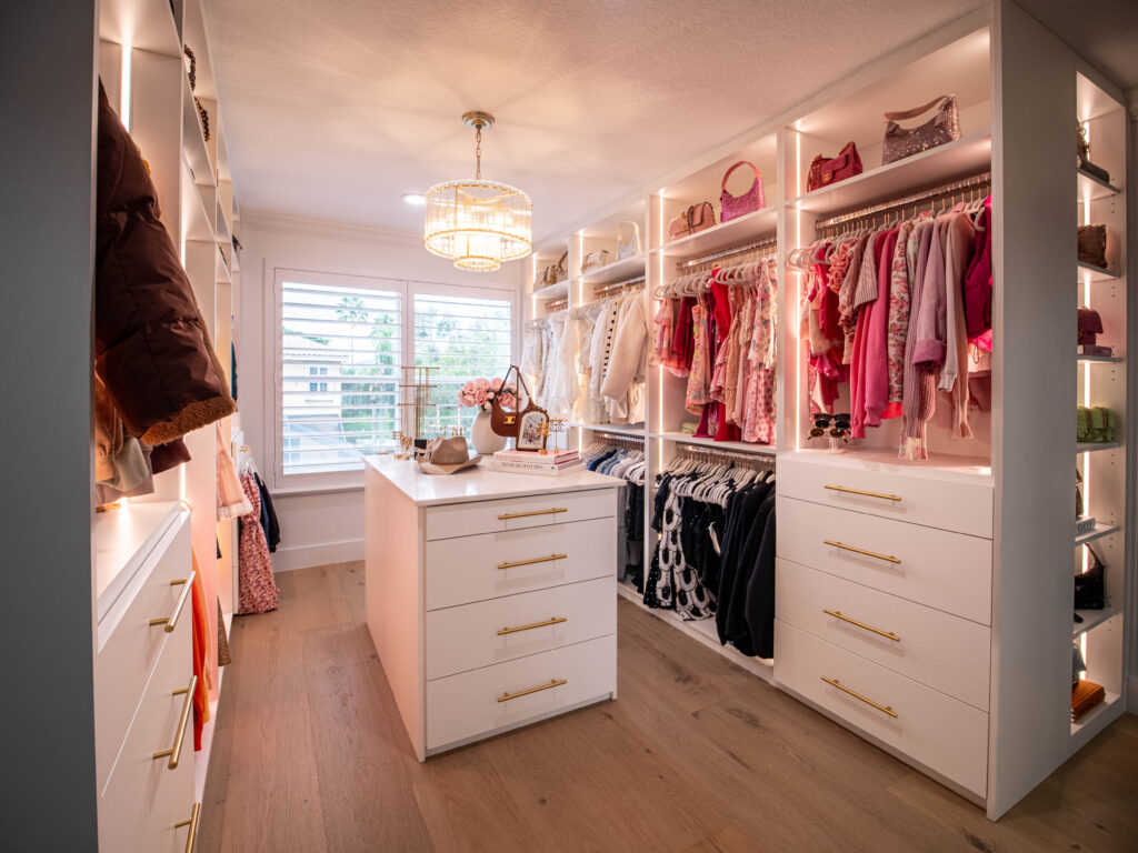 Elegant dressing room with symmetrical layout and central island.